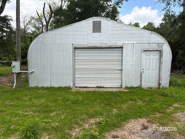 1301 Minglewood Road Liberty, TX 77575 - Photo 4 of 6 a view of a house with backyard
