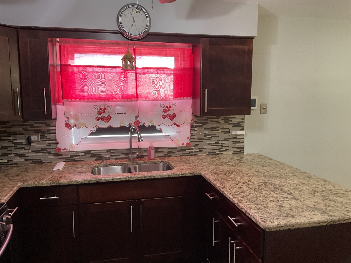 604 Exchange Avenue Calumet City, IL 60409 - Photo 13 of 39 a kitchen with a sink a counter space and a window