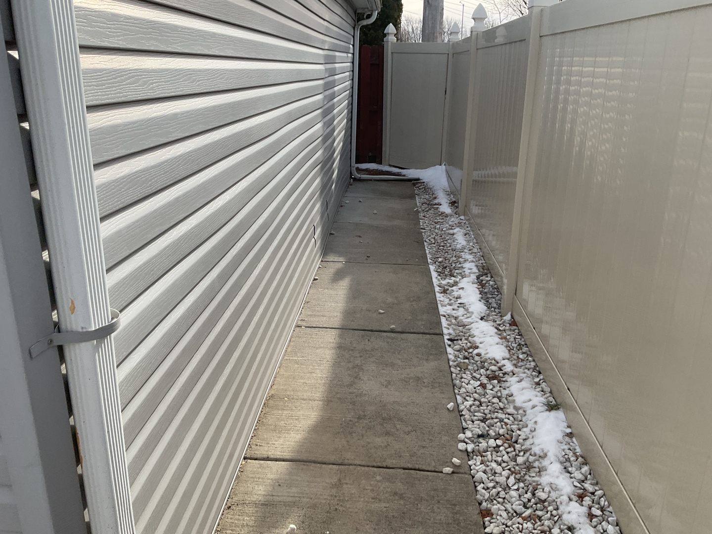 604 Exchange Avenue Calumet City, IL 60409 - Photo 35 of 39 a view of a pathway of a house with wooden floor