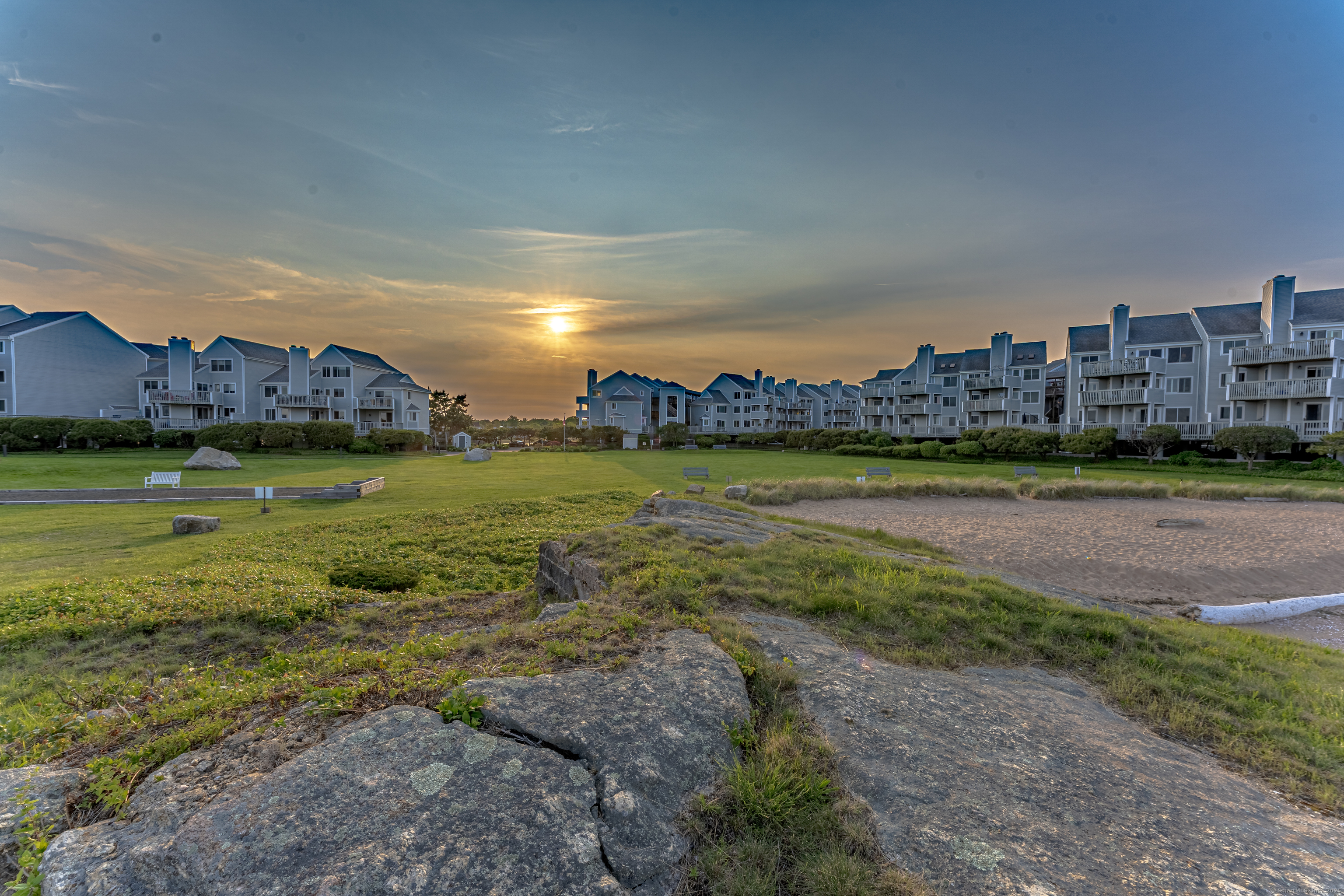 2 Mansfield Grove Road, Unit 374 East Haven, CT 06512 - Photo 30 of 30 a view of a field with an ocean