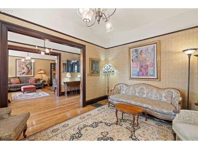 a living room with furniture and a table