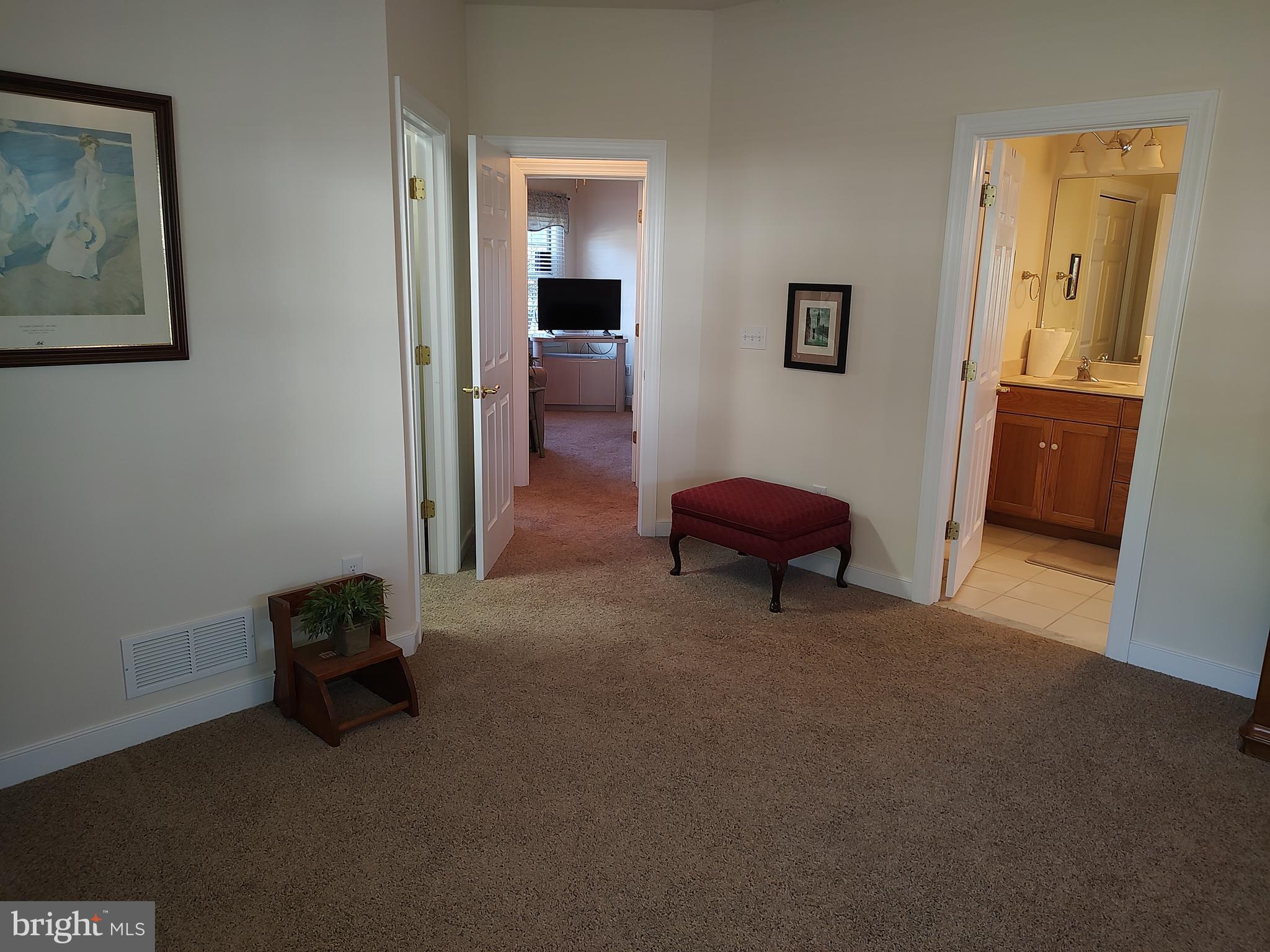 2 Castleberry Lane Georgetown, DE 19947 - Photo 26 of 46 a living room with furniture and a hallway