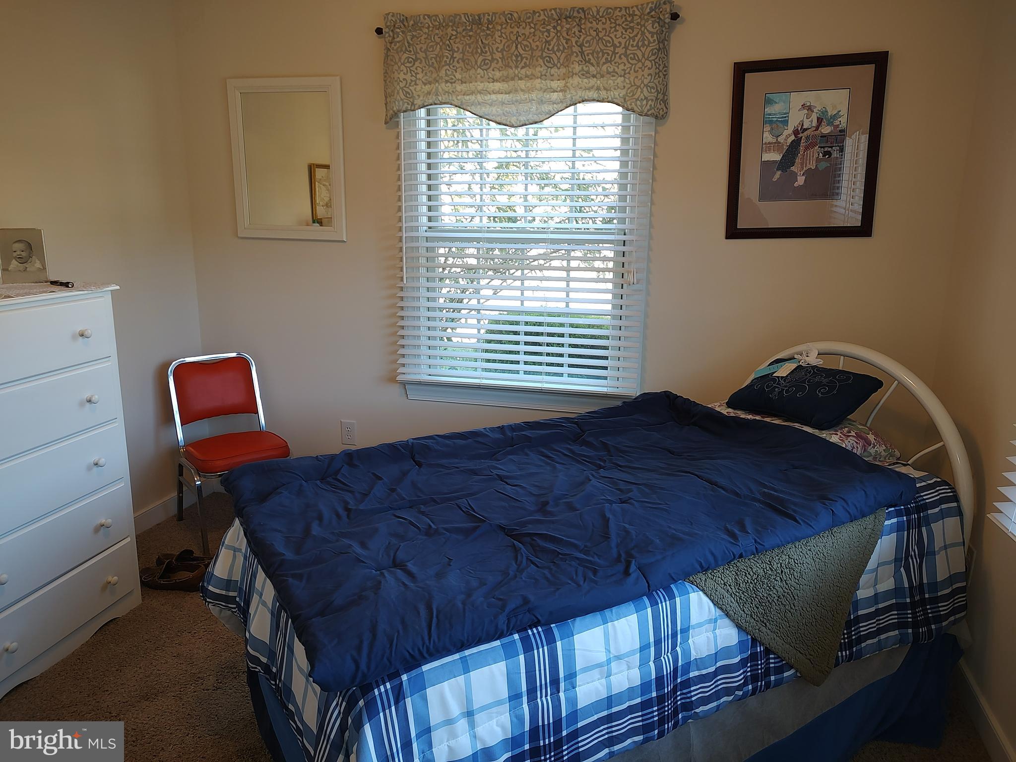 2 Castleberry Lane Georgetown, DE 19947 - Photo 33 of 46 a bedroom with a bed and a window