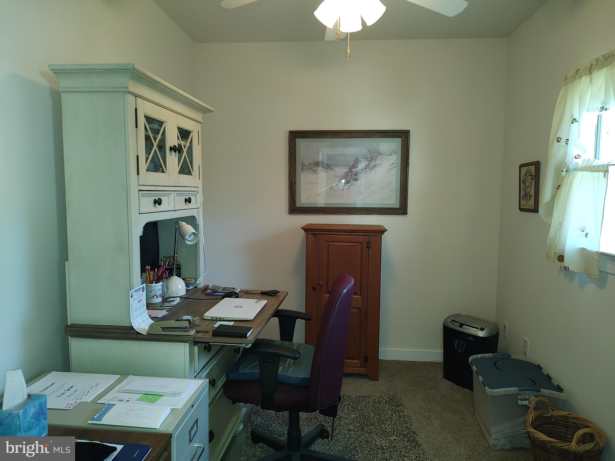 2 Castleberry Lane Georgetown, DE 19947 - Photo 39 of 46 a view of a workspace with furniture