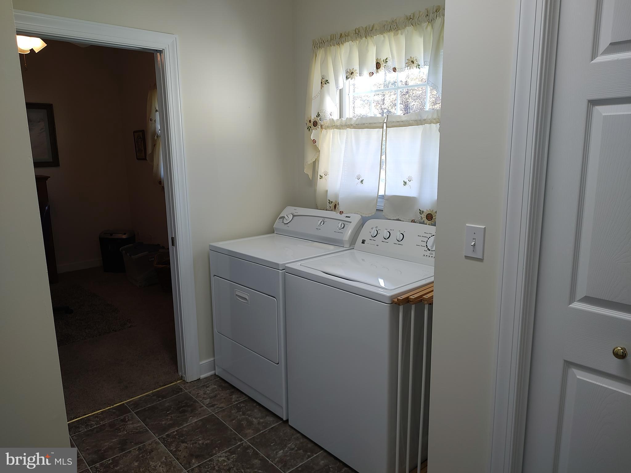 2 Castleberry Lane Georgetown, DE 19947 - Photo 40 of 46 a utility room with dryer and washer