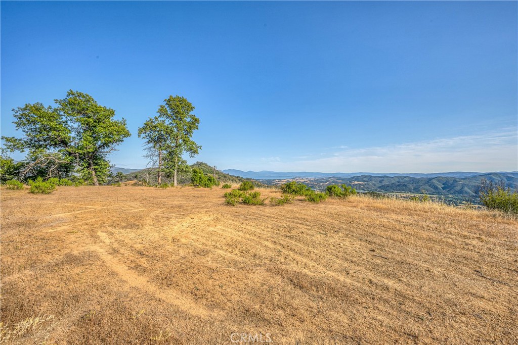 2055 Hunter Point Road Upper Lake, CA 95485 - Photo 1 of 1 a view of an ocean and a mountain