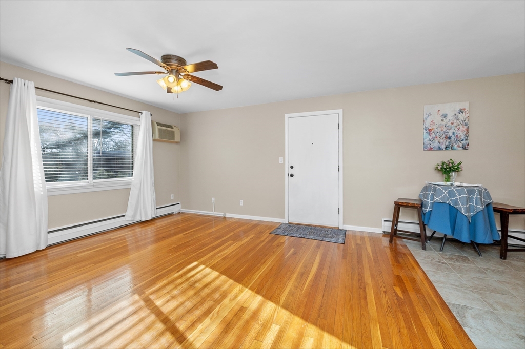 33 Jacqueline Road, Unit D Waltham, MA 02452 - Photo 9 of 26 a bedroom with a bed and a window