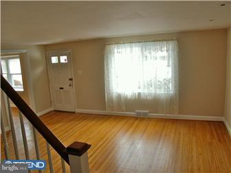 202 Wickford Road Havertown, PA 19083 - Photo 4 of 12 wooden floor in an empty room with a window