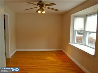 202 Wickford Road Havertown, PA 19083 - Photo 5 of 12 wooden floor in an empty room with a window