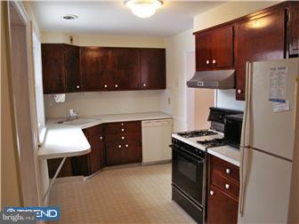 202 Wickford Road Havertown, PA 19083 - Photo 6 of 12 a kitchen with stainless steel appliances a stove a refrigerator and a microwave