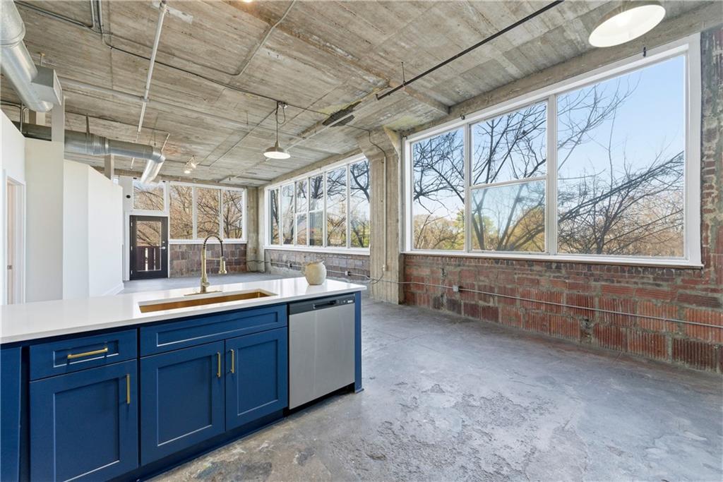 a view of a sink and a window
