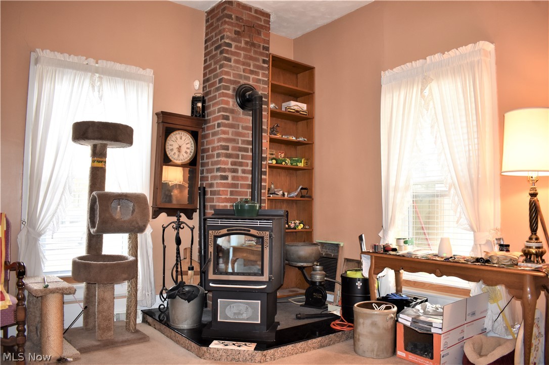 4901 South Ridge Road West Ashtabula, OH 44004 - Photo 20 of 35 Pellet stove with automatic feed and an electronic thermostat