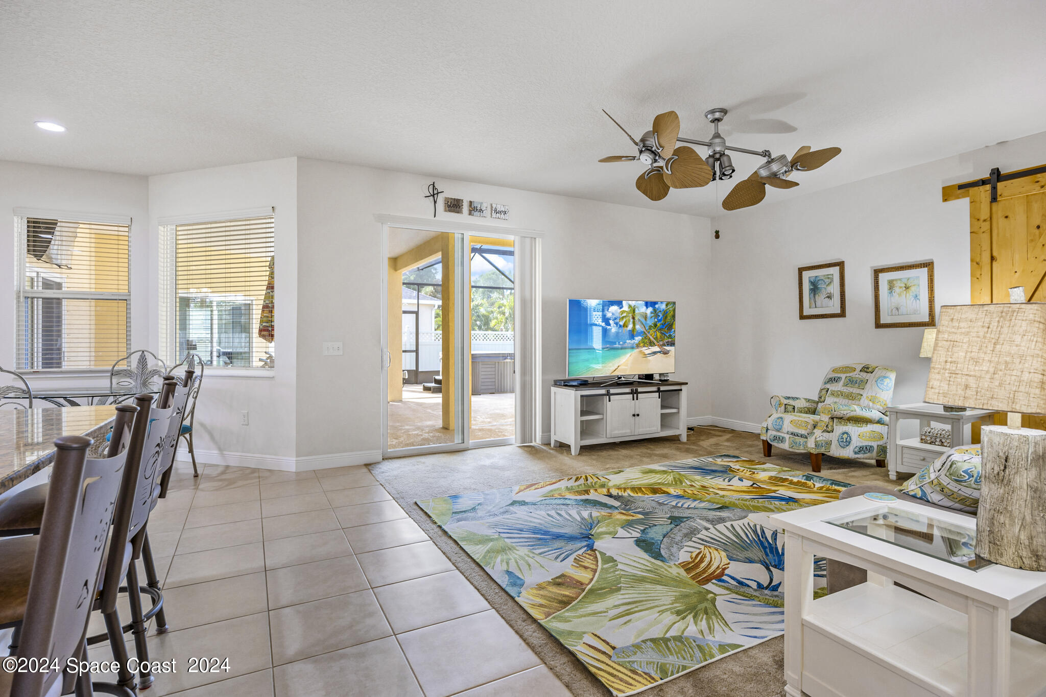 572 Glenbrook Circle Rockledge, FL 32955 - Photo 15 of 35 a living room with fireplace furniture and a window