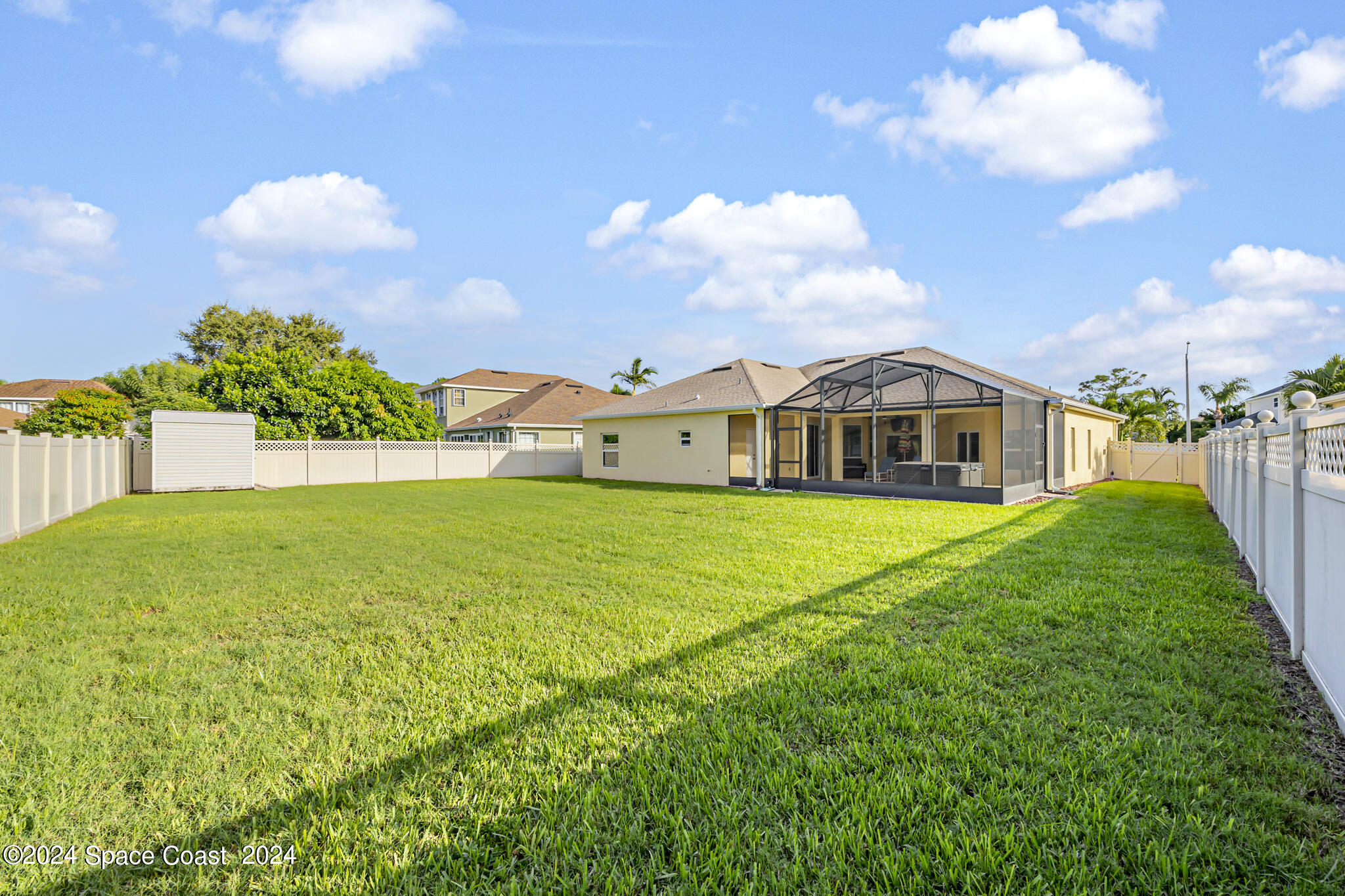 572 Glenbrook Circle Rockledge, FL 32955 - Photo 16 of 35 a view of an house with backyard and garden