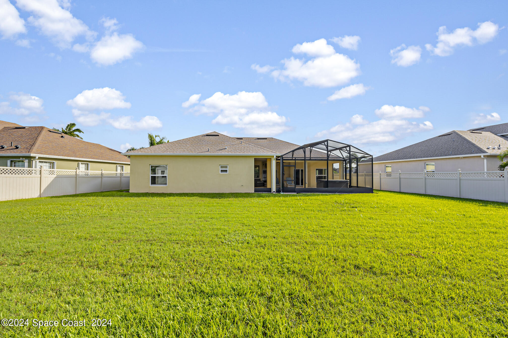 572 Glenbrook Circle Rockledge, FL 32955 - Photo 34 of 35 a front view of a house with garden