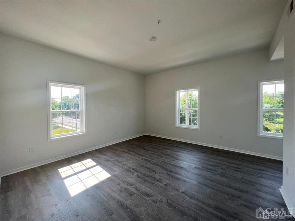 37 Old Trenton Road, Unit 17 Cranbury, NJ 08512 - Photo 4 of 11 a view of empty room with window