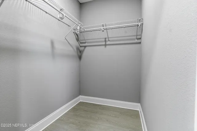 a view of an empty walk in closet