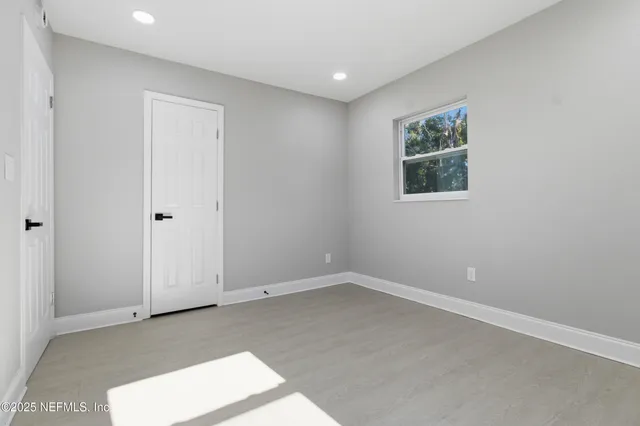 a view of a room with table and chair