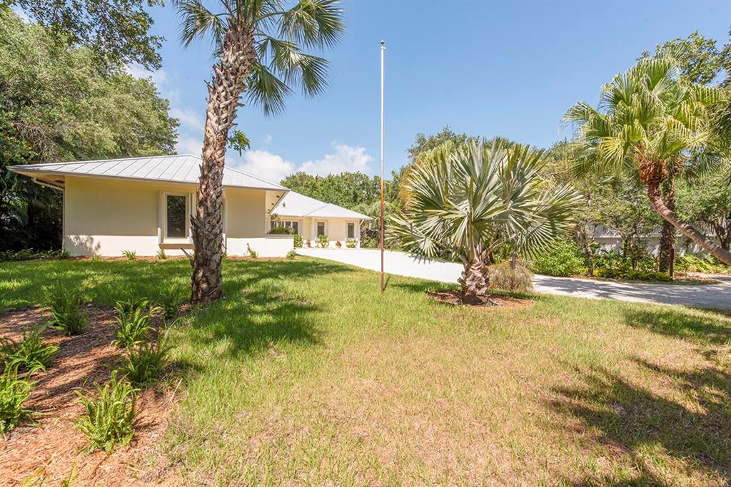 107 South Sewalls Point Road Stuart, FL 34996 - Photo 11 of 57 a view of a yard with swimming pool