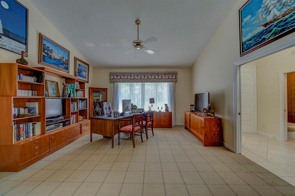 107 South Sewalls Point Road Stuart, FL 34996 - Photo 20 of 57 a view of a livingroom with furniture and staircase