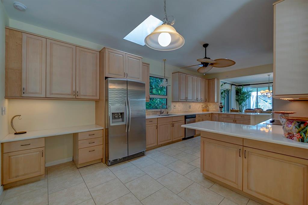 107 South Sewalls Point Road Stuart, FL 34996 - Photo 28 of 57 a kitchen with cabinets and window