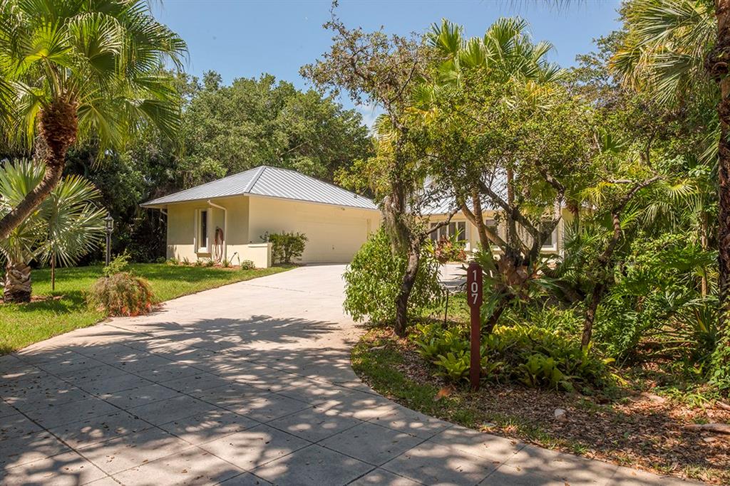 107 South Sewalls Point Road Stuart, FL 34996 - Photo 4 of 57 a view of a house with a yard