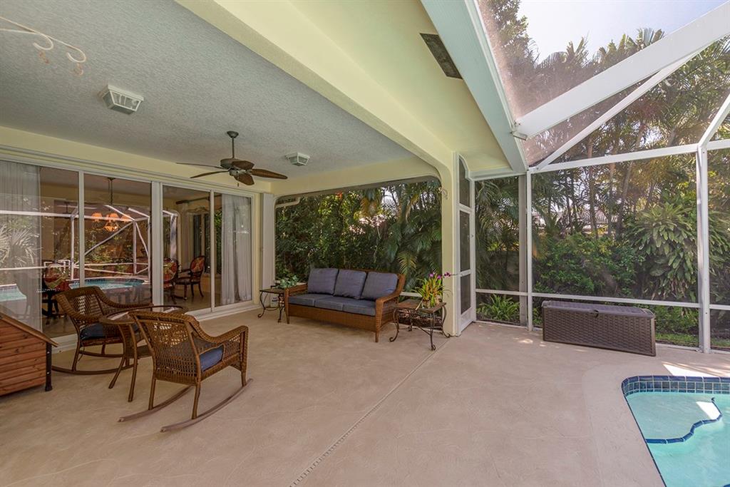 107 South Sewalls Point Road Stuart, FL 34996 - Photo 45 of 57 a view of a patio with a table and chairs