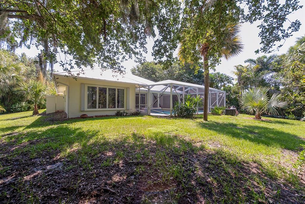 107 South Sewalls Point Road Stuart, FL 34996 - Photo 55 of 57 a view of a house with backyard and sitting area