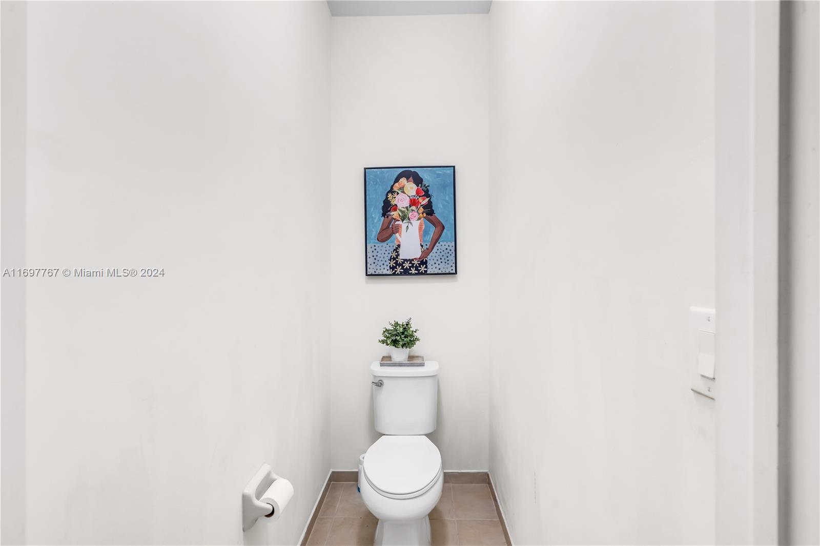 17403 Southwest 155th Court Miami, FL 33187 - Photo 19 of 42 a bathroom with a toilet and a shower