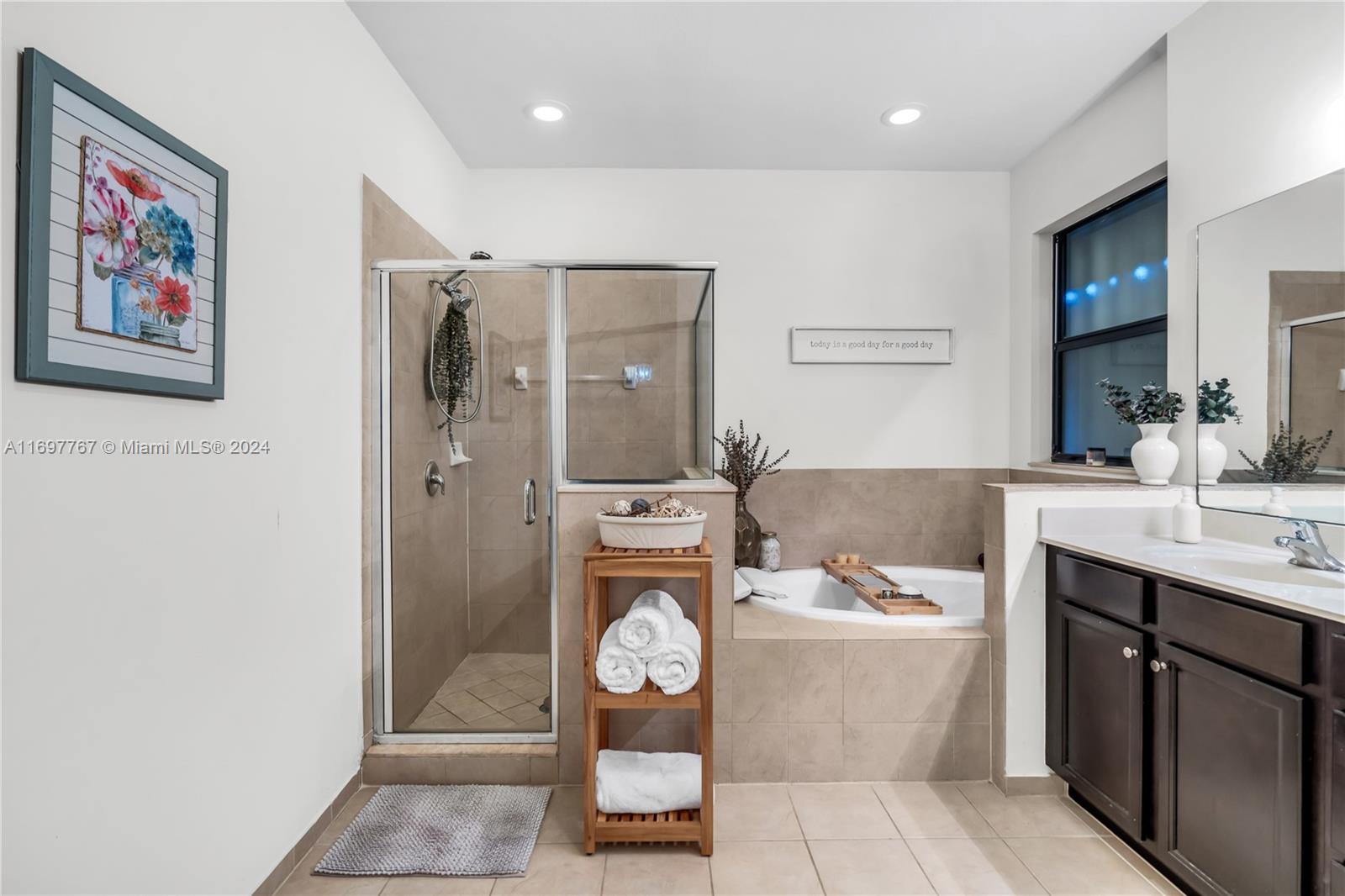 17403 Southwest 155th Court Miami, FL 33187 - Photo 20 of 42 a bathroom with a sink a toilet and shower