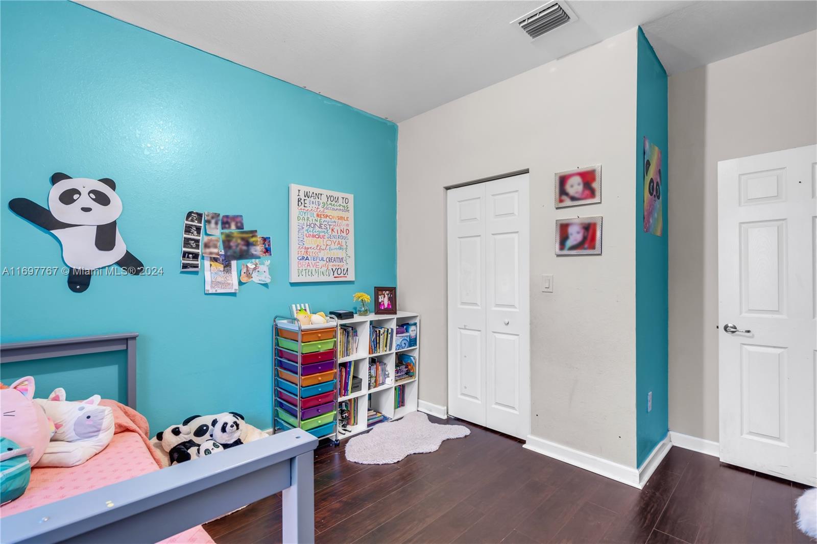 17403 Southwest 155th Court Miami, FL 33187 - Photo 28 of 42 a room with toys and wooden floor