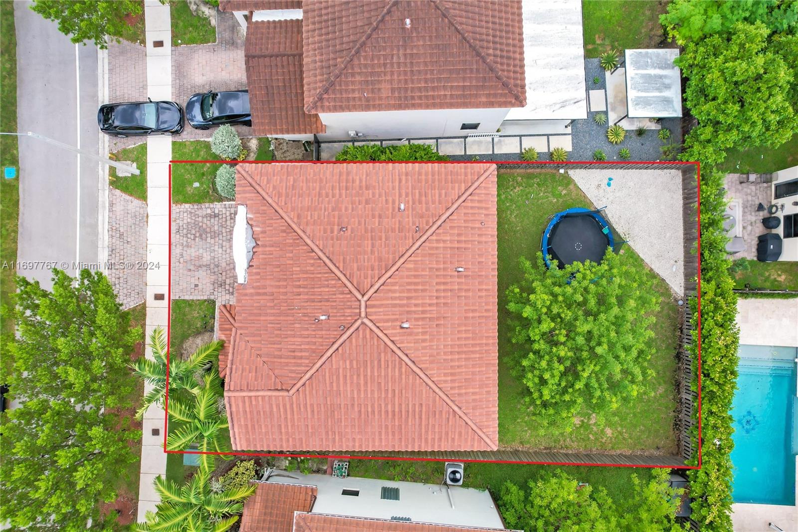 17403 Southwest 155th Court Miami, FL 33187 - Photo 32 of 42 an aerial view of a house with a garden and plants