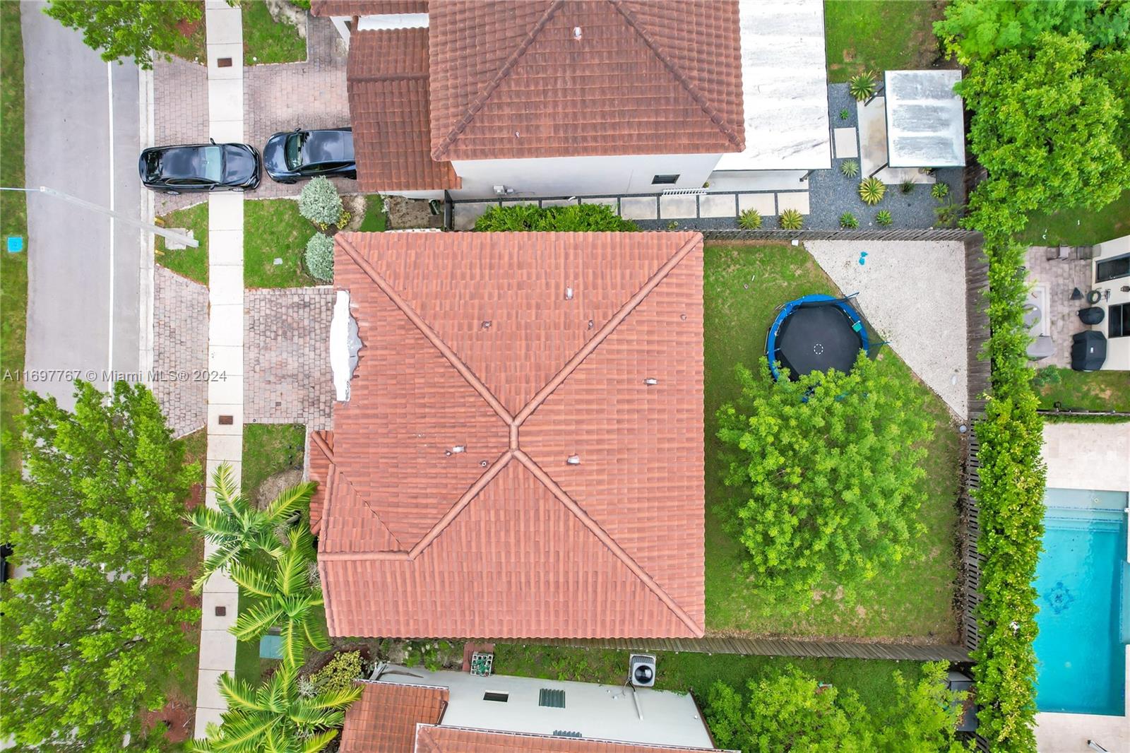 17403 Southwest 155th Court Miami, FL 33187 - Photo 33 of 42 an aerial view of a house with a garden and plants