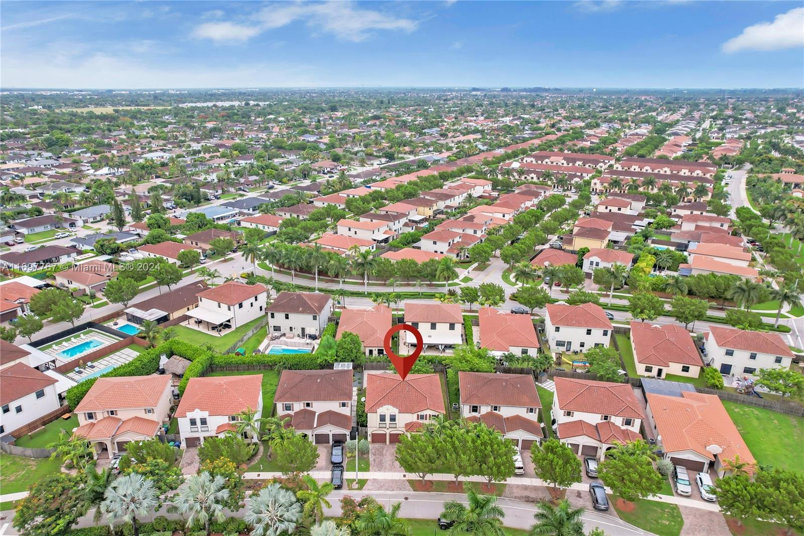 17403 Southwest 155th Court Miami, FL 33187 - Photo 34 of 42 an aerial view of residential houses with outdoor space