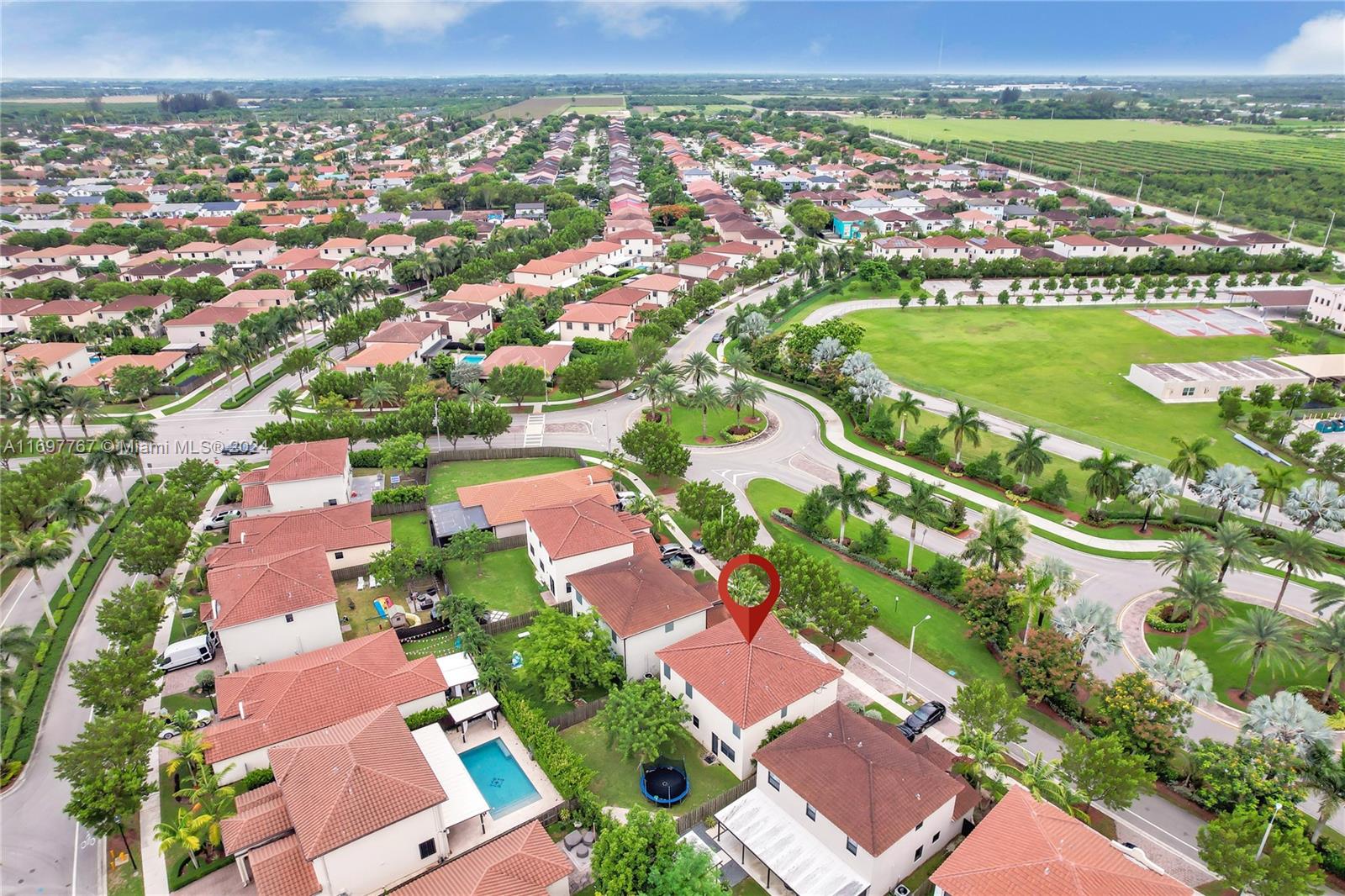 17403 Southwest 155th Court Miami, FL 33187 - Photo 36 of 42 an aerial view of residential houses with outdoor space