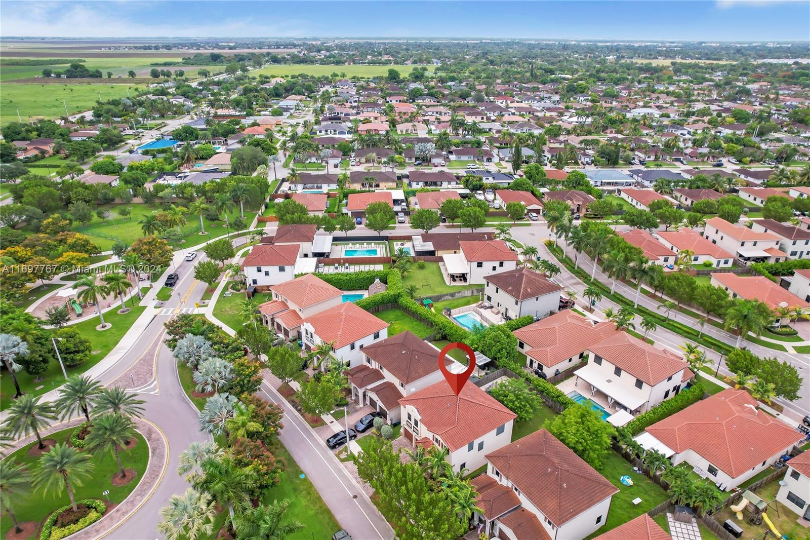 17403 Southwest 155th Court Miami, FL 33187 - Photo 38 of 42 an aerial view of residential houses with outdoor space