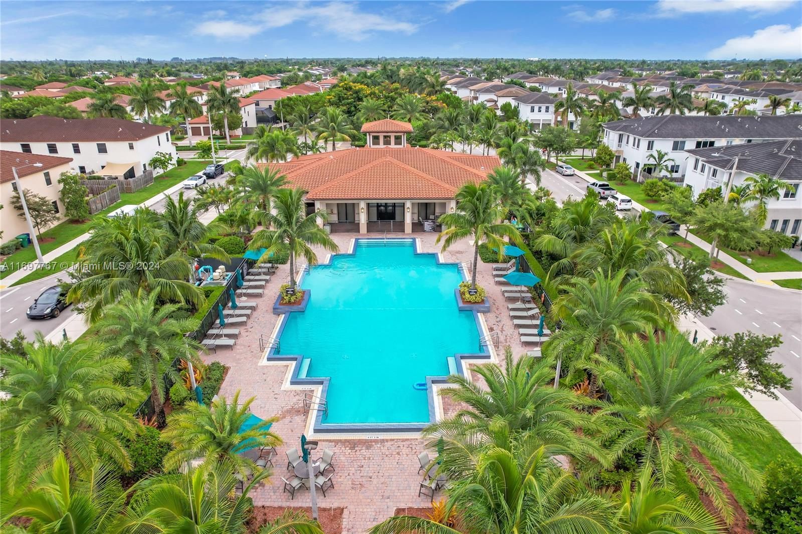 17403 Southwest 155th Court Miami, FL 33187 - Photo 40 of 42 an aerial view of a house with a yard and lake view