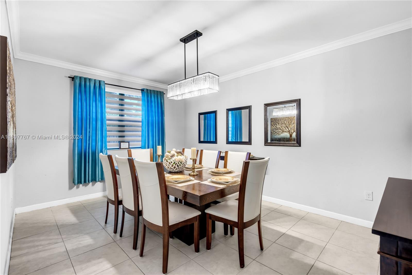 17403 Southwest 155th Court Miami, FL 33187 - Photo 8 of 42 a dining room with furniture and window