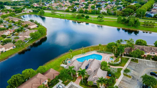 a view of a lake with a yard