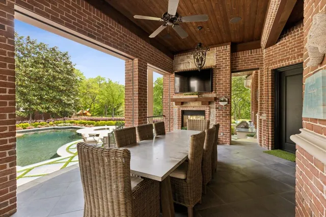 a dining room with furniture and a fireplace