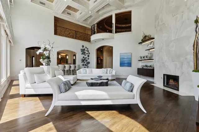 a living room with fireplace furniture and a fireplace