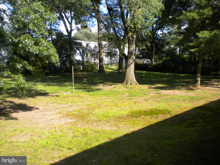 32 Cold Spring Road Mercerville, NJ 08619 - Photo 15 of 16 a view of a swimming pool with an outdoor space