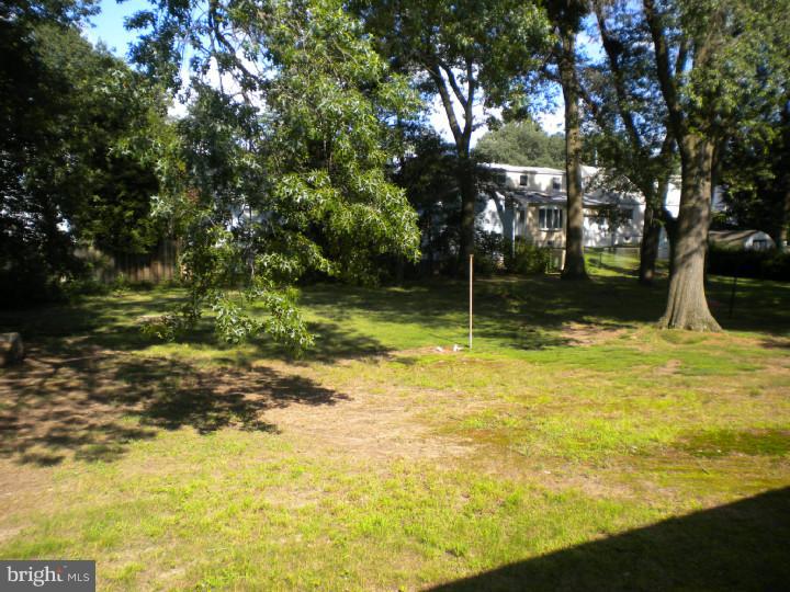 32 Cold Spring Road Mercerville, NJ 08619 - Photo 16 of 16 a view of a yard with swimming pool