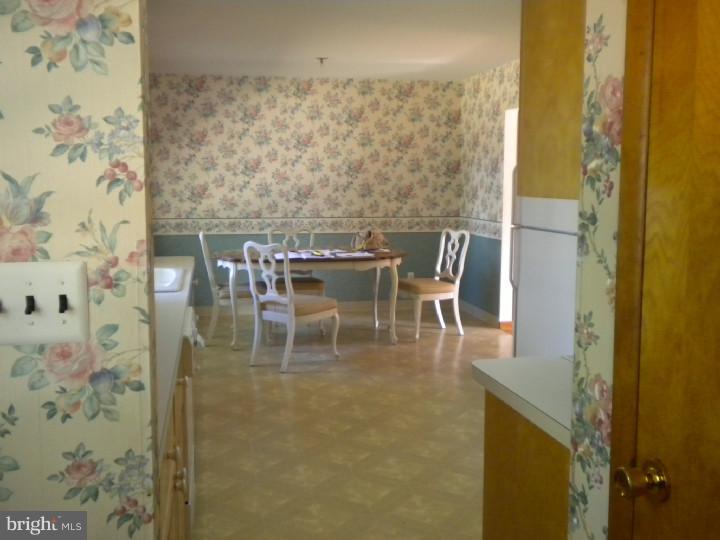 32 Cold Spring Road Mercerville, NJ 08619 - Photo 4 of 16 a dining room with furniture and wooden floor