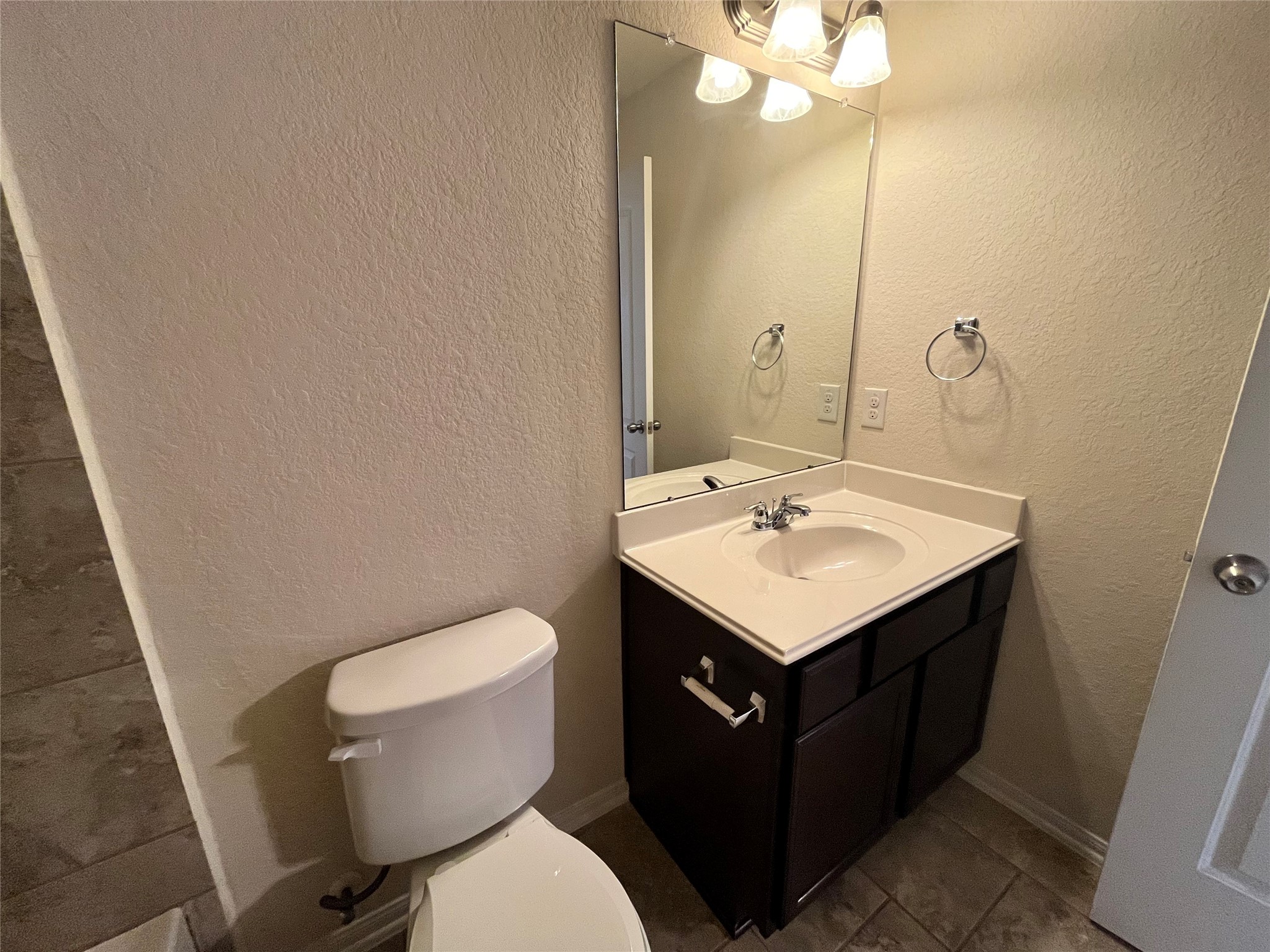 15103 Signal Ridge Way Cypress, TX 77429 - Photo 27 of 38 a bathroom with a sink toilet vanity and granite