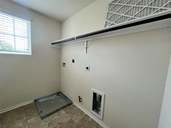 a picture of a bench in a white building
