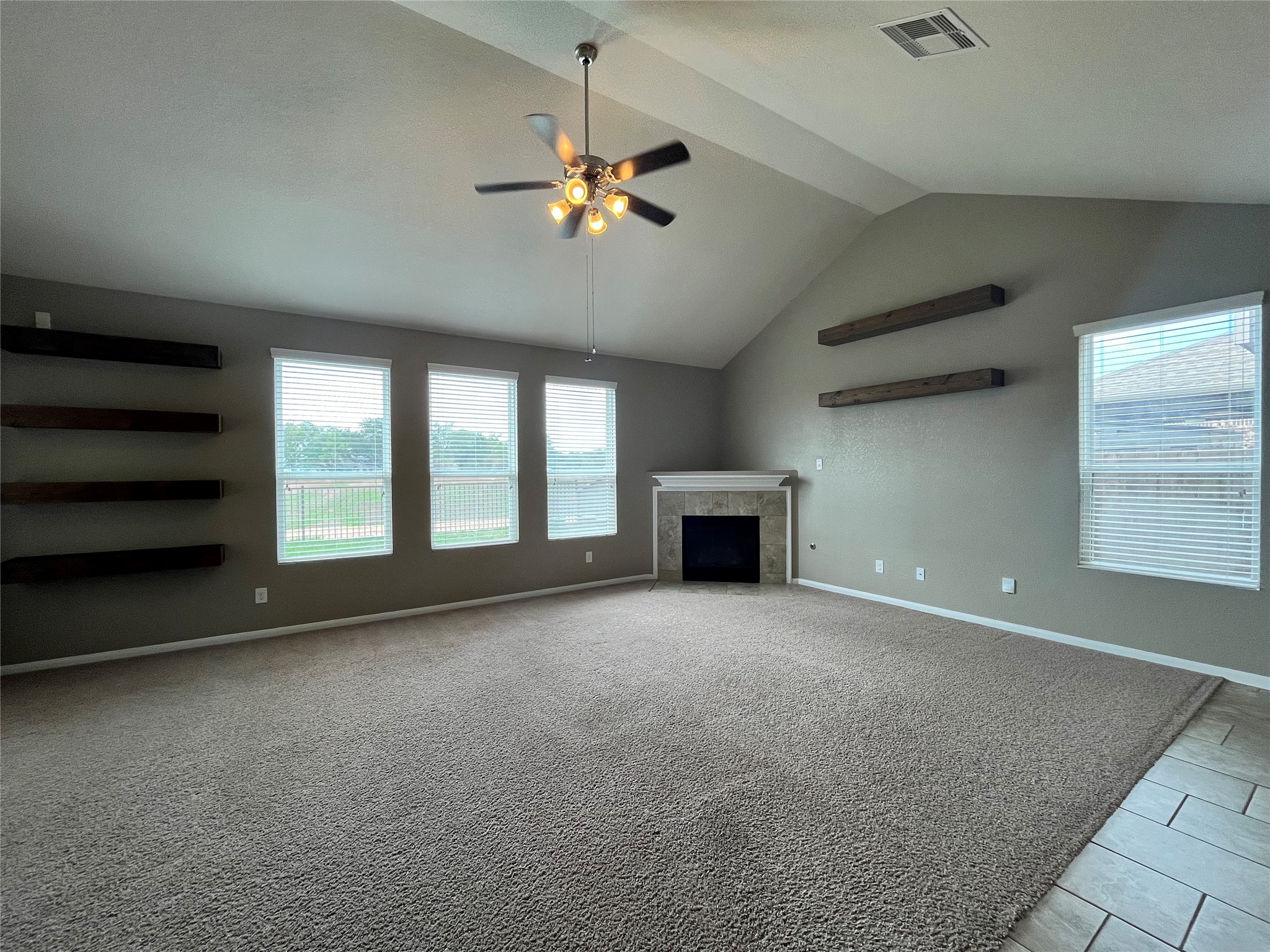 15103 Signal Ridge Way Cypress, TX 77429 - Photo 4 of 38 wooden floor in an empty room with a window