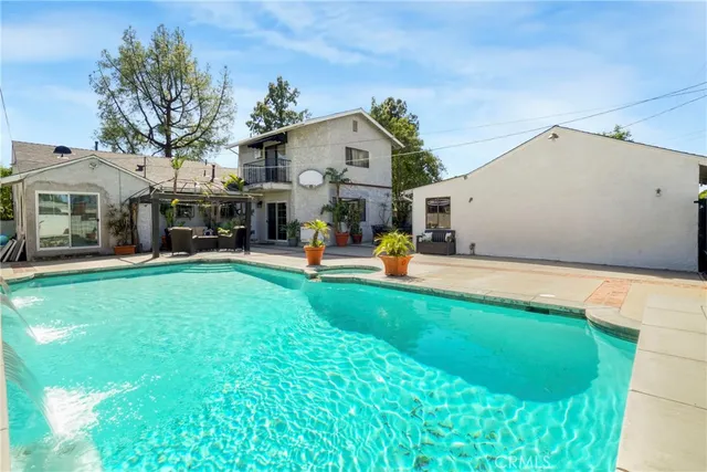 a front view of building with yard