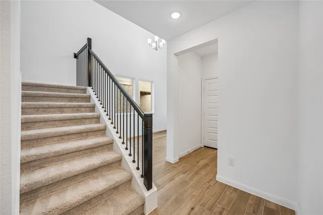 a view of entryway with wooden floor