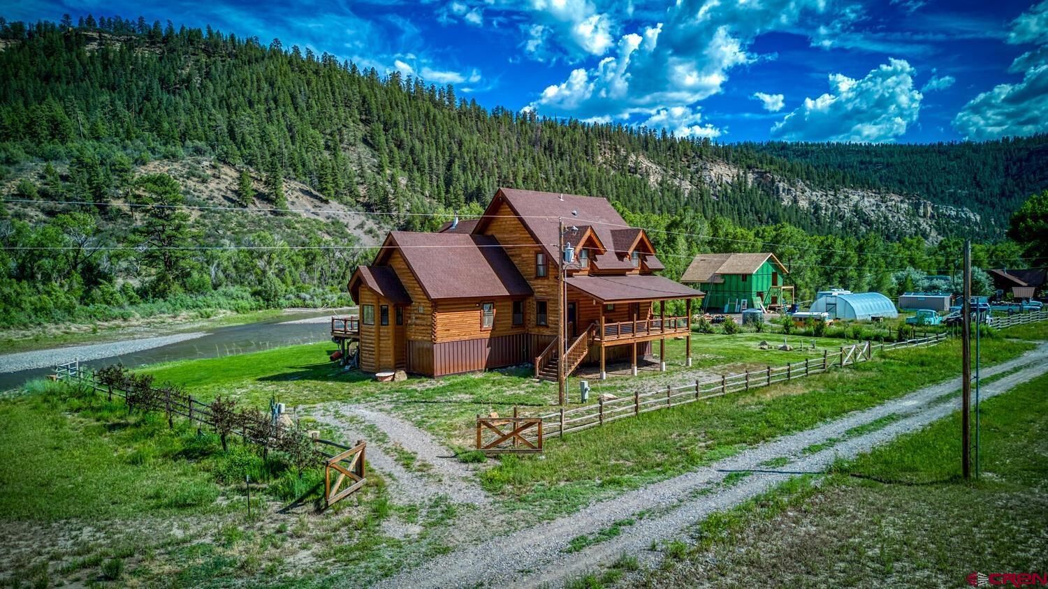 228 Estates Circle Road Pagosa Springs, CO 81147 - Photo 31 of 35 a garden view with a seating space